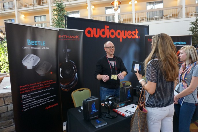 Stephen Mejias at the AudioQuest booth RMAF 2015 showing off the NightHawks
