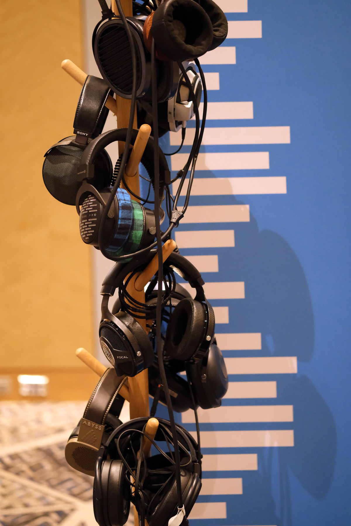 Headphone Tree with selection of headphones using the Dekoni Earpads